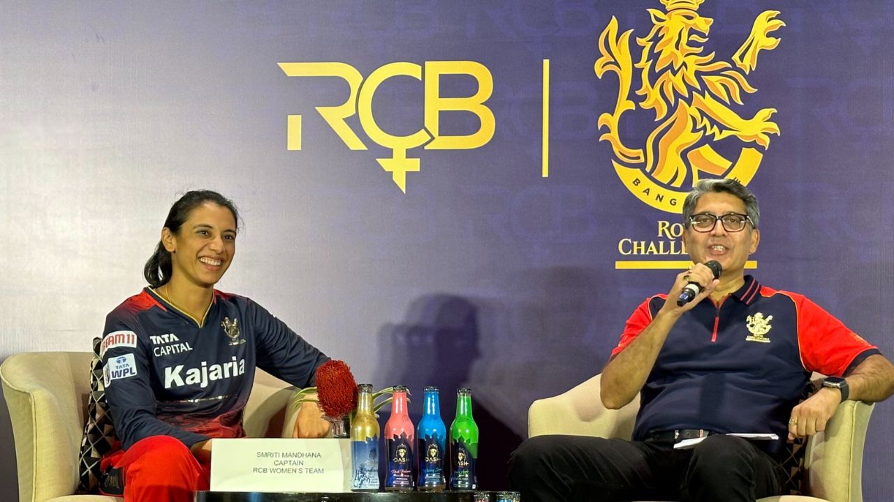 Responding to Storyboard18's question, cricketer Smriti Mandhana said WPL is the right step in the direction of equal pay for women in sports. “Equal pay was an amazing move by the BCCI, and I would like to thank them for this step. We have witnessed how the IPL for the men’s team has benefited them. I hope that the same luck favors the women’s cricket team too. The Women’s Premier League is starting and is the next big step for the women’s cricket team in India. I hope this leads them in the right direction,” she said. (From left to right: RCB captain Smriti Mandhana, and RCB chairman Prathmesh Mishra)