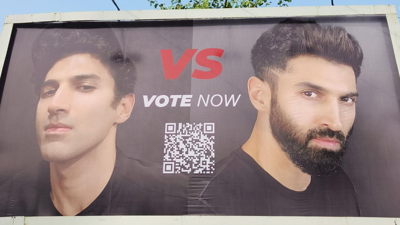 The billboard encouraged people to vote for their preferred look using a QR code that redirected them to a polling website. With no context provided, the website hinted at a bet.